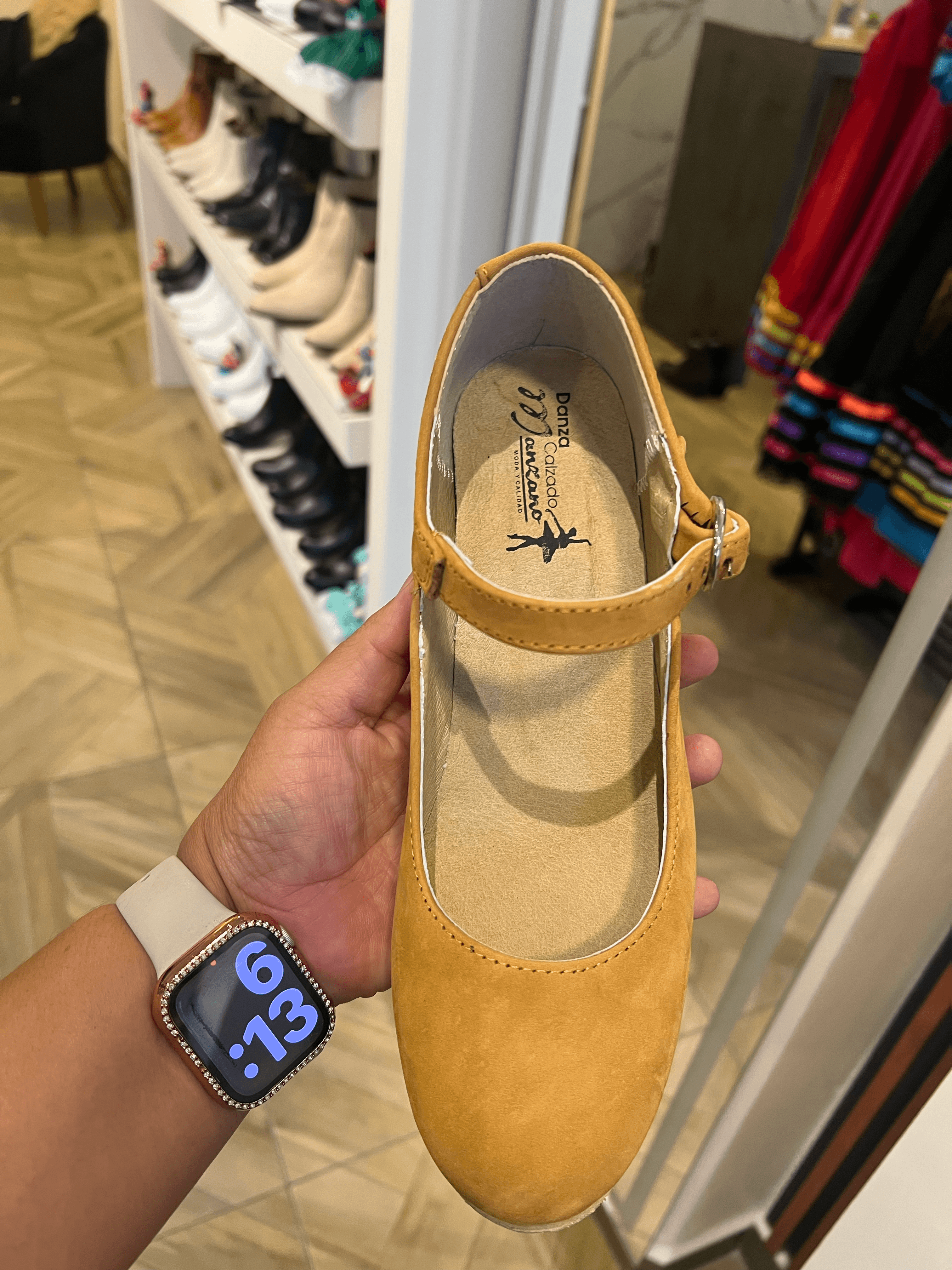 Young dancer modeling tan folklórico shoes